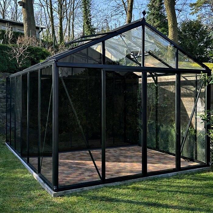 Serre en verre avec compartiment de rangement