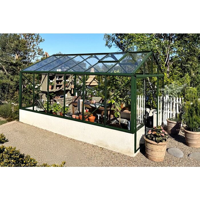 Bloomcabin Classic greenhouse on masonry wall base USA