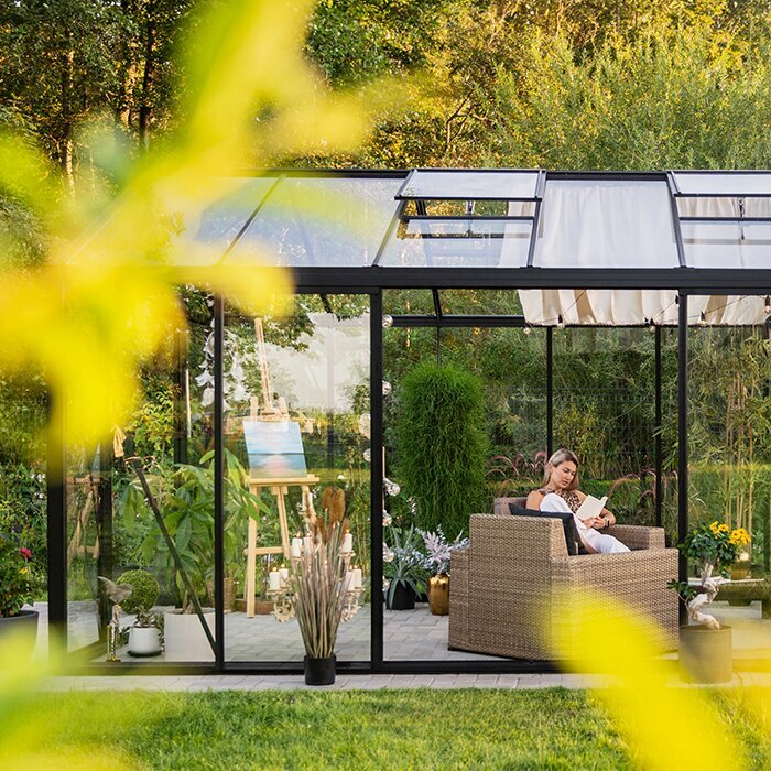 Glass greenhouse with natural Accoya wood storage design in an American backyard