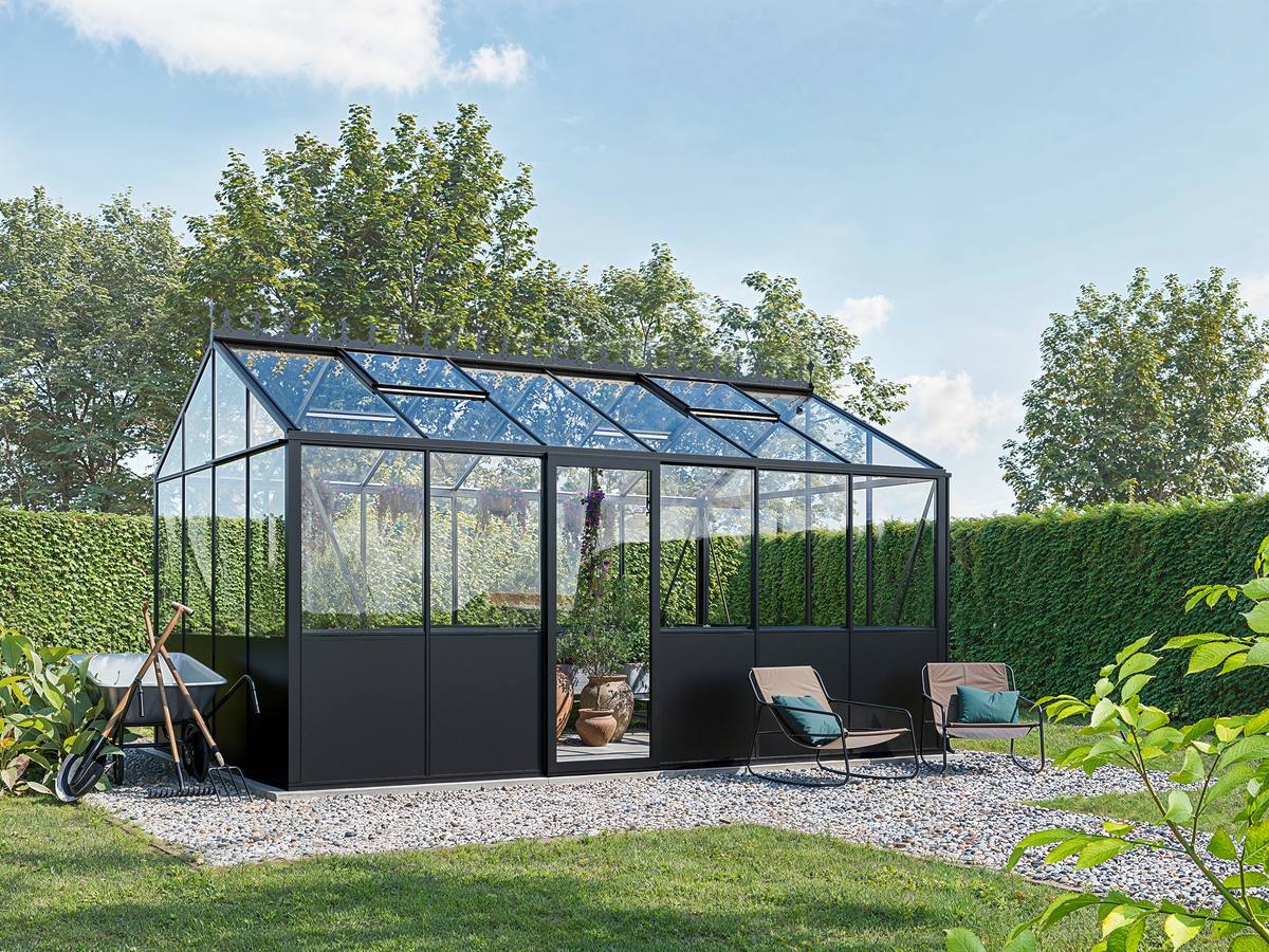 Bloomcabin Prestige greenhouse in an outdoor setting