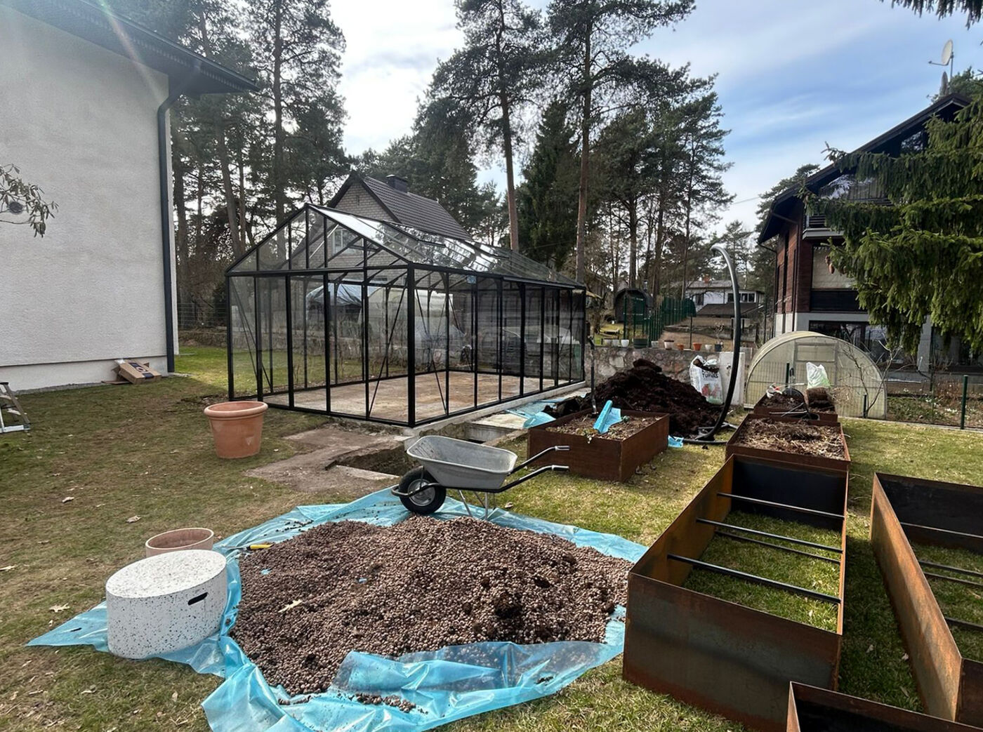 A greenhouse that became the garden centerpiece installation photo 2